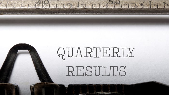 Quarterly resluts on typewriter close up