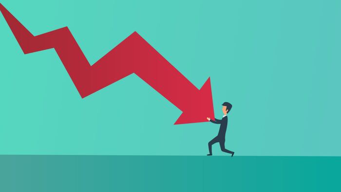 Vector of businessman pushing back against red descending arrow
