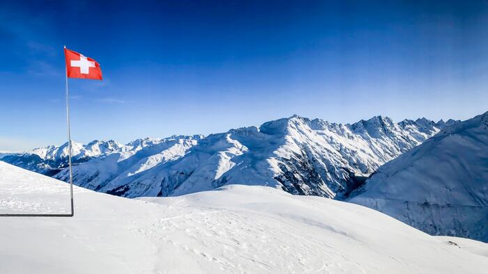 swiss flag on a mountain