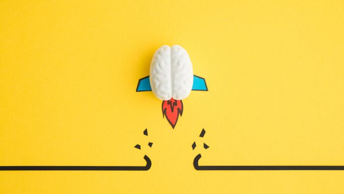 Brain rocket bursting through horizontal line
