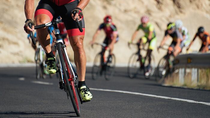 Cycling competition,cyclist athletes riding a race at high speed