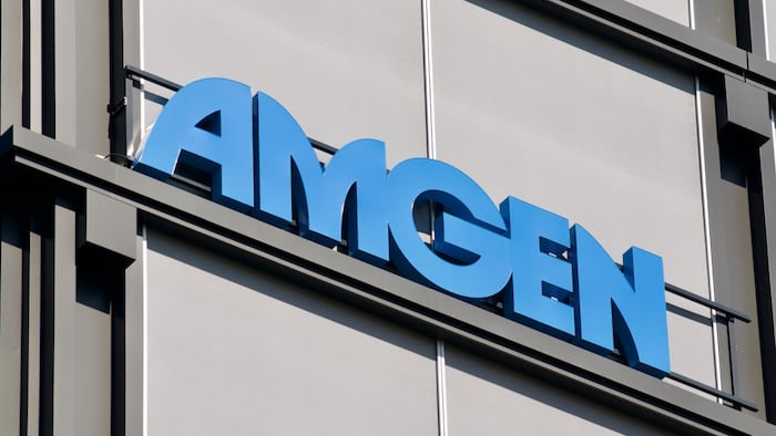 Amgen logo sign hanging on the office building in Rotkreuz, Switzerland