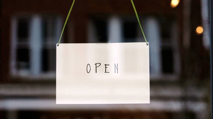 open sign on door (Alamy)