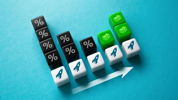 Decreasing percentage symbols transferring into increasing cash symbols