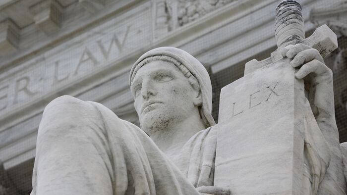 Justice in front of Law