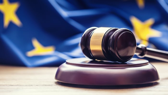 EU flag with gavel, European law concept