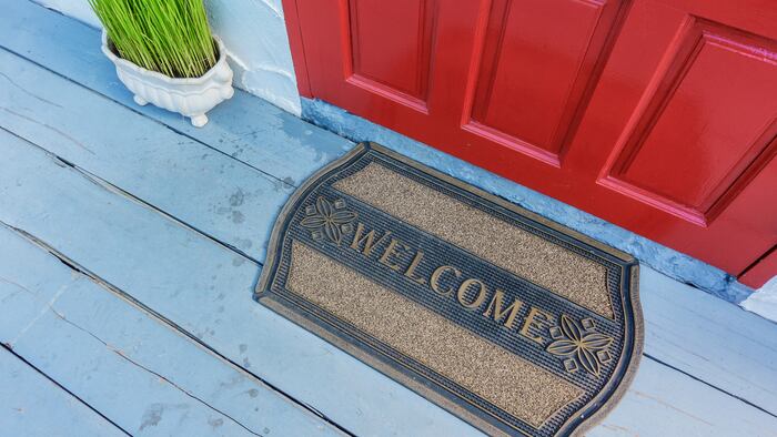 Welcome mat outside the front door - Image