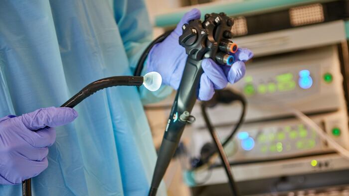 doctor holding Endoscope