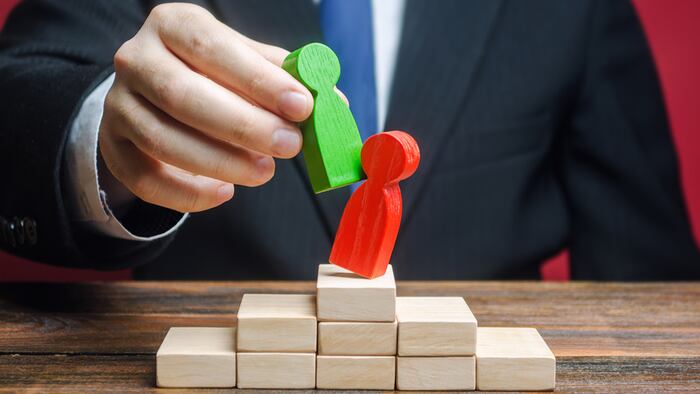 Leadership change CEO wooden blocks