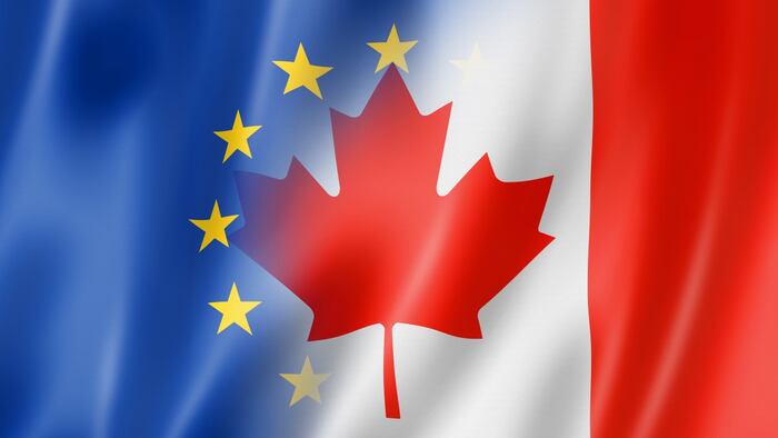 EU and Canadian flags, mixed
