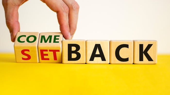 Setback/comeback written on wooden blocks