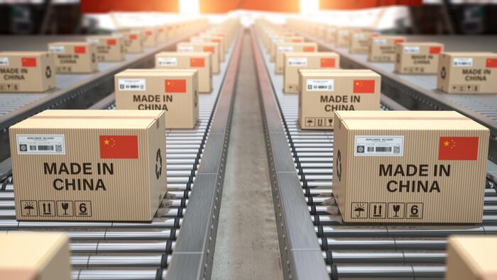 Made in China. Cardboard boxes with text made in China and chinese flag on the roller conveyor. 3d illustration - Illustration