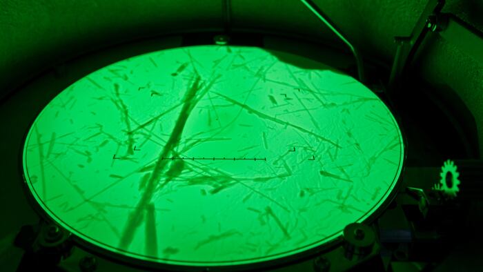 Chrysotile fibers (asbestos variety) seen on the fluorescent screen of a transmission electron microscope (TEM), x30 000 magnification. Environmental laboratory specialised in asbestos