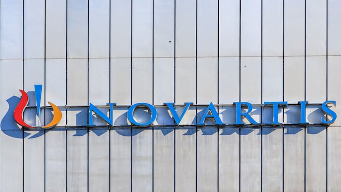 Basel, Switzerland - 27 August, 2016: sign on the wall of a Novartis building. Novartis International AG is a Swiss pharmaceutical company based in Basel, Switzerland.