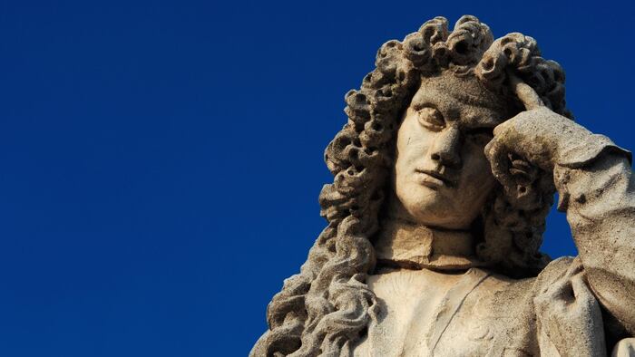 Statue of a man in thought