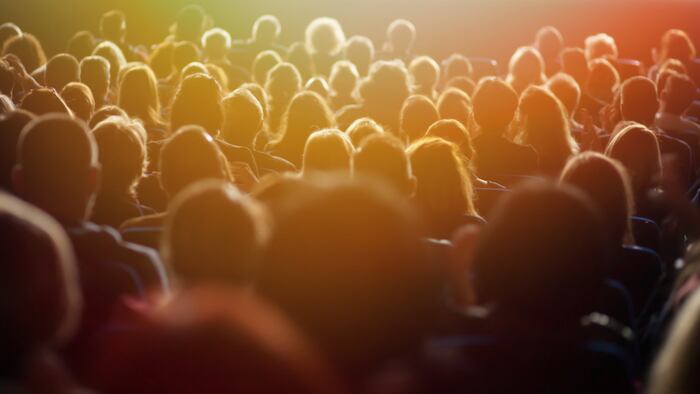 theater audience watching a performance