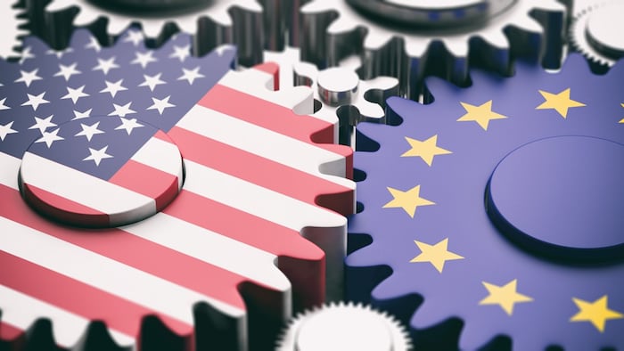 European Union and USA flags on metal gears