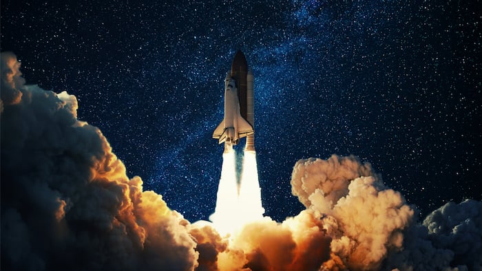 Rocket takes off in the starry sky. Spaceship begins the mission. Space shuttle taking off on a Planet Mars.