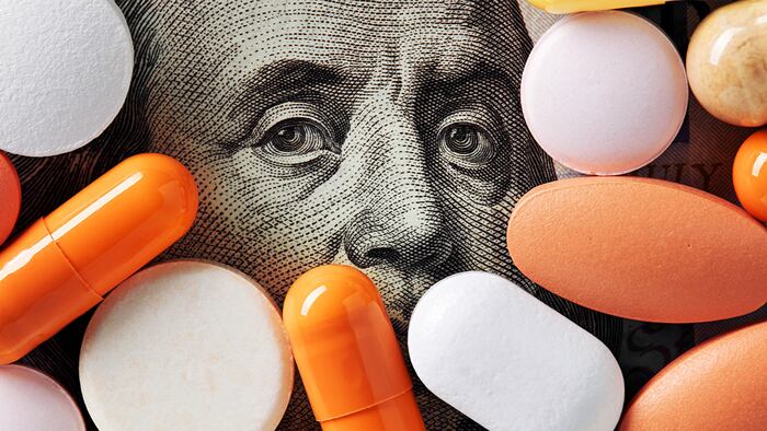 $100 covered in pills
