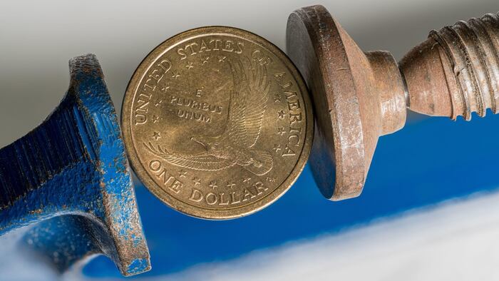 US dollar coin squeeze price pressure