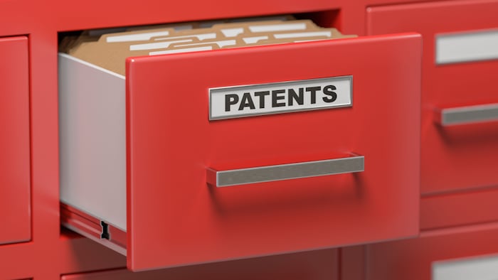 Patent files and documents in cabinet in office.