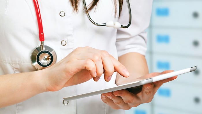 Young Doctor With Digital Tablet