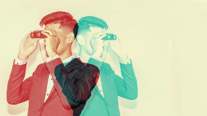 Man holding binoculars