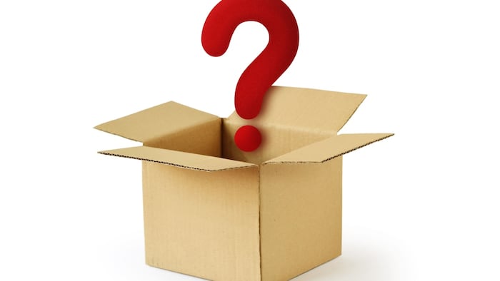 Cardboard box with question mark - Concept of mystery box