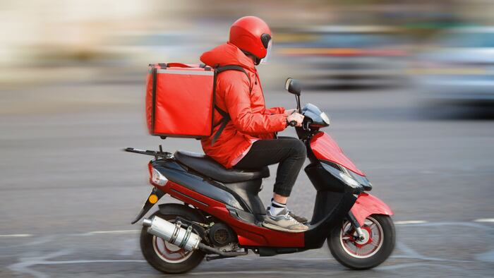 delivery driver on scooter