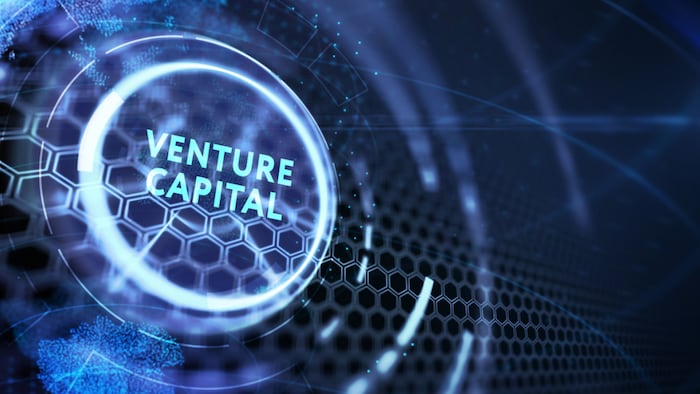 Venture capital dial on a blue background