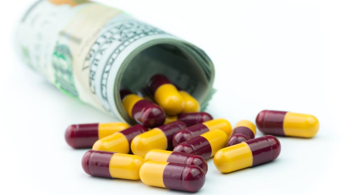 RollOfDollarswithPills_1200x675