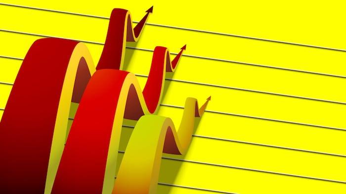 Three arrows going up on yellow background