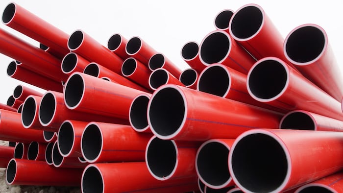 Red pipes on white background