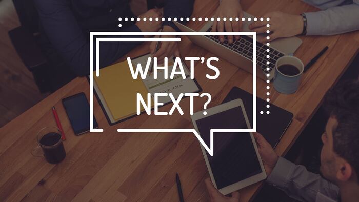 What's next? sign at business meeting