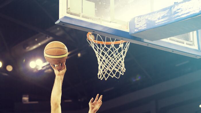 Shooting basketball