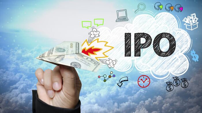 businessman hand holding dollar plane with IPO text ,business idea , business concept, analysis concept