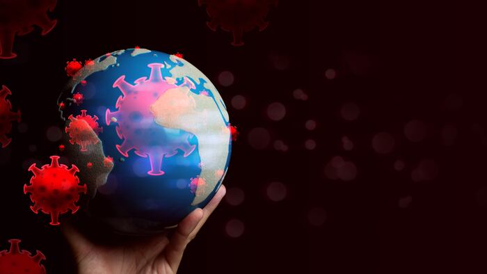 human hand holding the global world for blood dna of covid-19 structure