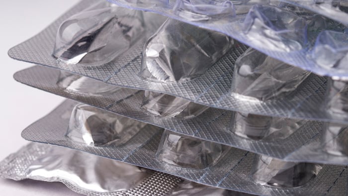 Empty blister packs, drug shortage concept. used empty packaging from pills close up