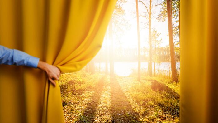 hand open curtain - concept of change and reveal new better world