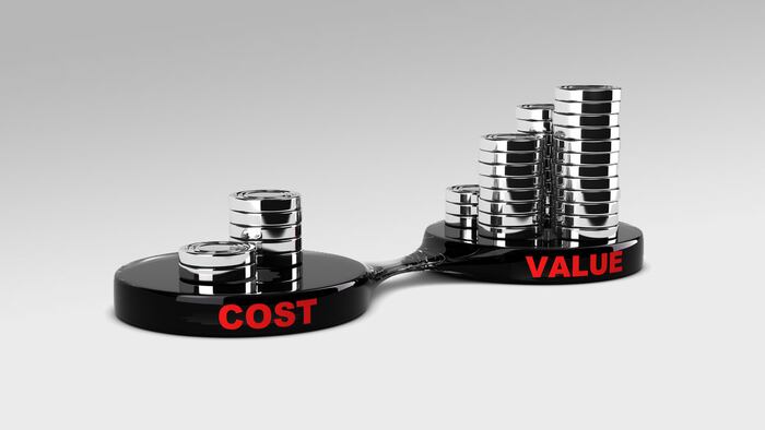 Cost and Value Concept, abstract coins piles. Conceptual image for marketing analysis.