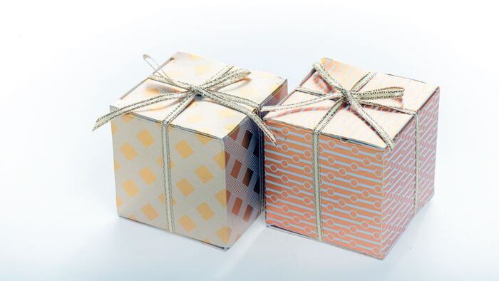 golden gift boxes isolated on white background