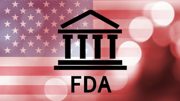 Building icon with inscription FDA and flag of The United States over abstract background. - Illustration