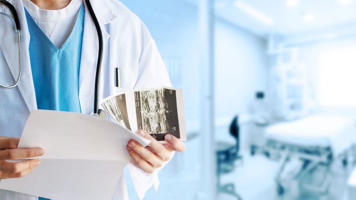 Doctor with Mammography - Image
