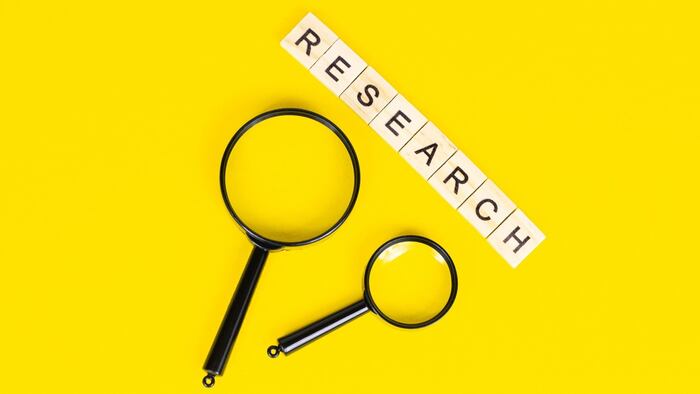 Research Concept With Magnifying Glass