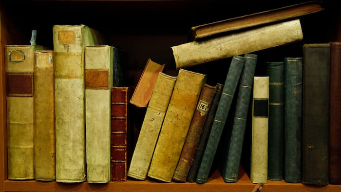 old books on the shelf - Image
